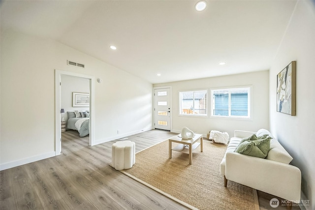 1322 Crescent Ave, Centralia, WA 98531 - living area with wood finished floors, recessed lighting, and vaulted ceiling