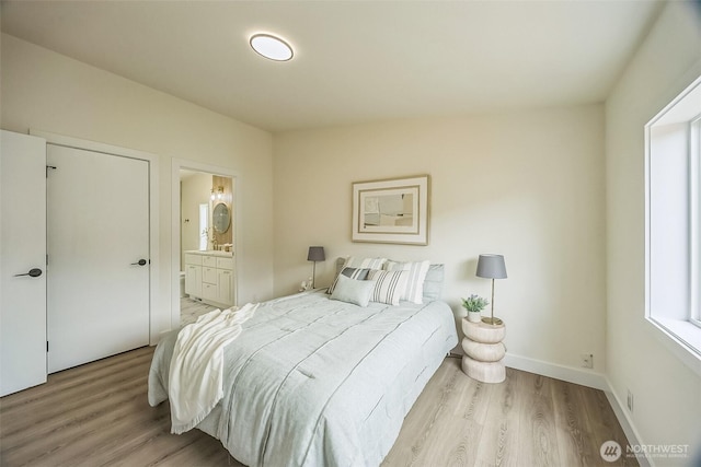 1322 Crescent Ave, Centralia, WA 98531 - bedroom featuring light wood-style flooring and ensuite bath