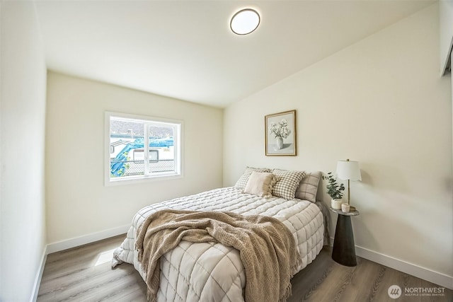 1322 Crescent Ave, Centralia, WA 98531 - bedroom featuring wood finished floors and vaulted ceiling