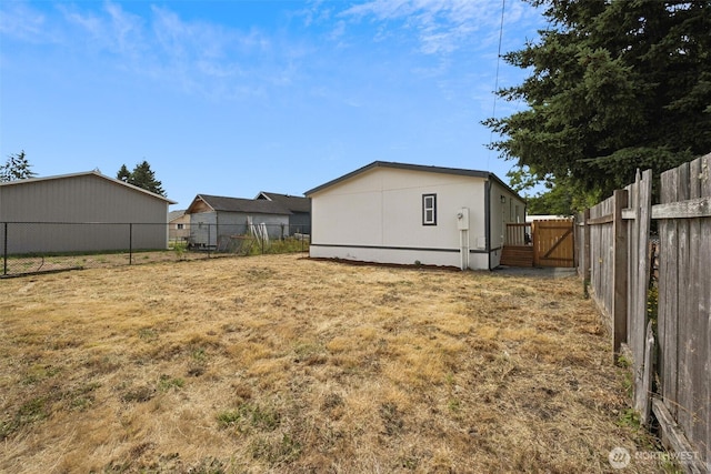 1322 Crescent Ave, Centralia, WA 98531 - fenced backyard featuring a gate