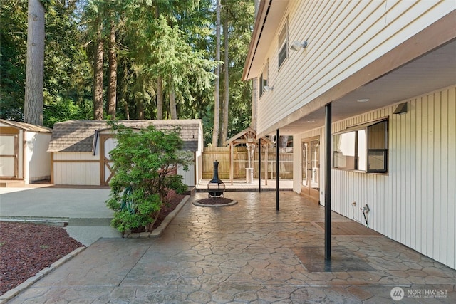 17310 Palatine Ave N, Shoreline, WA 98133 - view of patio with a storage unit and french doors