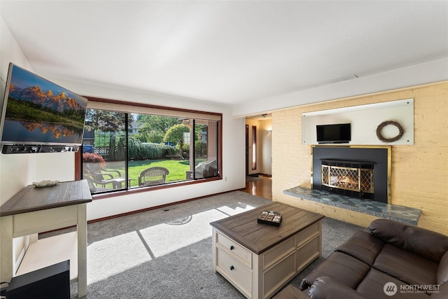 17310 Palatine Ave N, Shoreline, WA 98133 - carpeted living room with a glass covered fireplace and baseboards