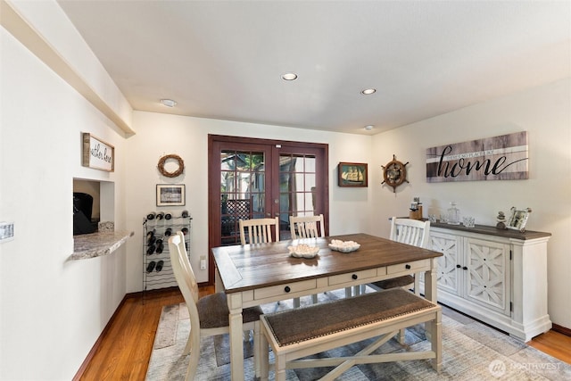 17310 Palatine Ave N, Shoreline, WA 98133 - dining area featuring light wood-style floors, recessed lighting, and french doors