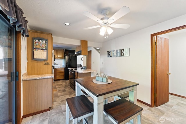 17310 Palatine Ave N, Shoreline, WA 98133 - dining space with a ceiling fan and baseboards