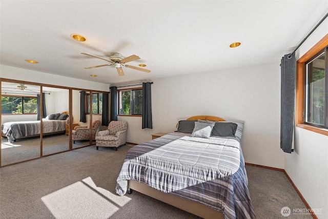 17310 Palatine Ave N, Shoreline, WA 98133 - carpeted bedroom featuring multiple windows, a ceiling fan, and recessed lighting