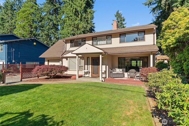 17310 Palatine Ave N, Shoreline, WA 98133 - rear view of property featuring a chimney, a lawn, and a shingled roof
