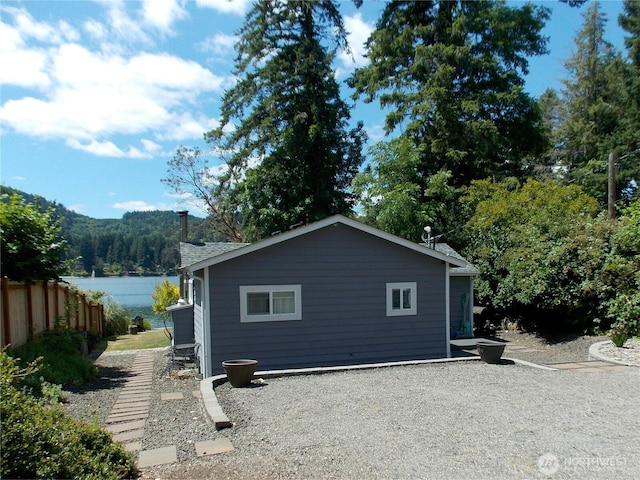 3223 Aspinwall Rd NW, Olympia, WA 98502 - view of home's exterior featuring a forest view