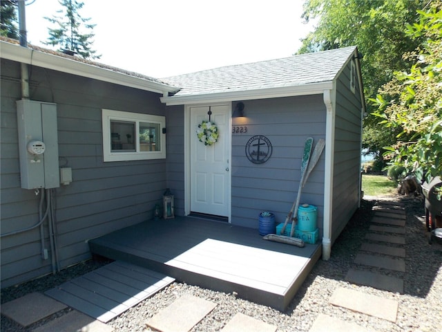 3223 Aspinwall Rd NW, Olympia, WA 98502 - doorway to property with a shingled roof