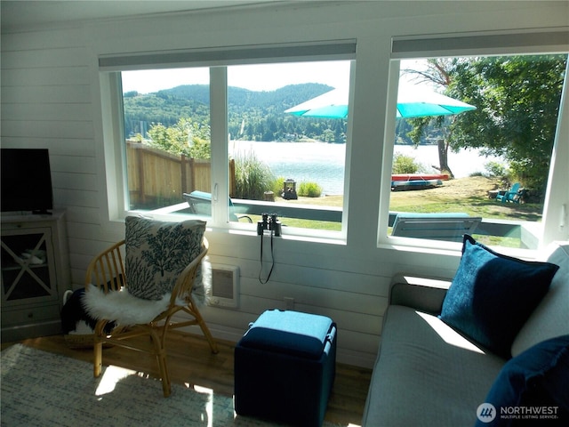 3223 Aspinwall Rd NW, Olympia, WA 98502 - sunroom featuring a water view and a wall unit AC