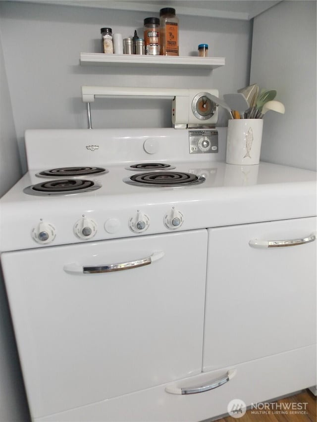 3223 Aspinwall Rd NW, Olympia, WA 98502 - detailed view of open shelves and white range with electric cooktop