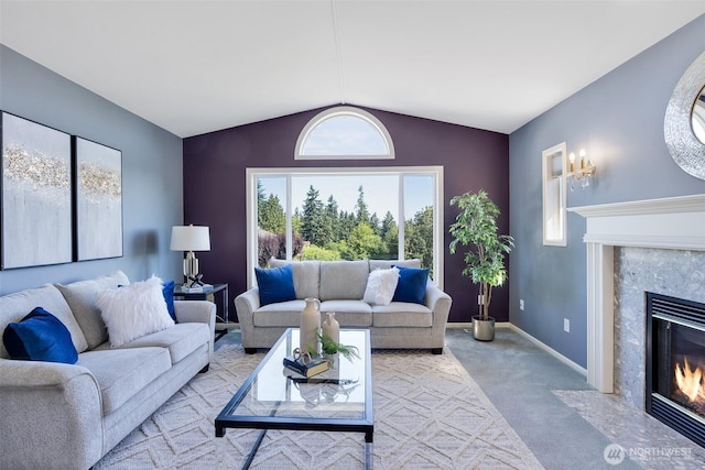 7332 156th St SE, Snohomish, WA 98296 - carpeted living area with a premium fireplace, vaulted ceiling, and healthy amount of natural light