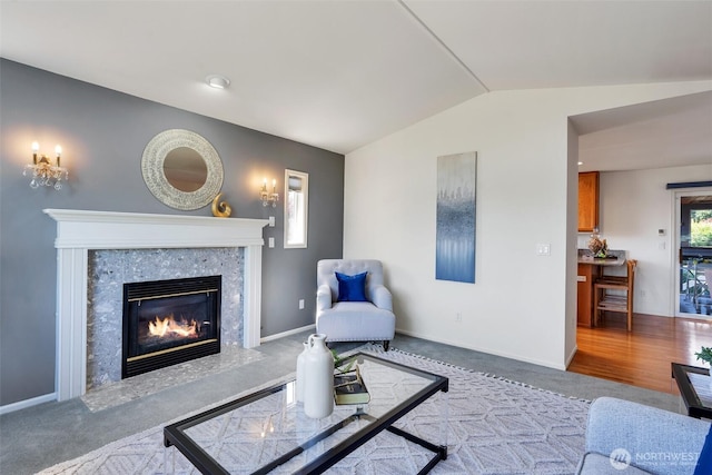 7332 156th St SE, Snohomish, WA 98296 - carpeted living area featuring lofted ceiling and a high end fireplace