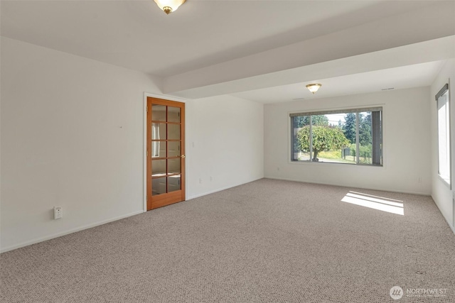 7332 156th St SE, Snohomish, WA 98296 - carpeted empty room with plenty of natural light