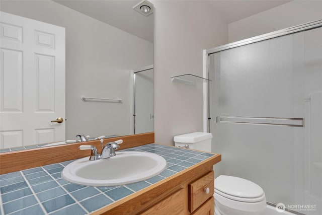 7332 156th St SE, Snohomish, WA 98296 - full bathroom featuring a shower stall and vanity