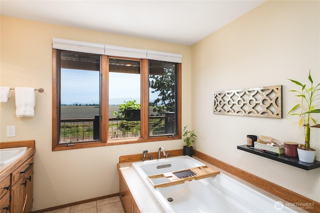14785 Channel Dr, La Conner, WA 98257 - full bath featuring a tub with jets, vanity, and tile patterned floors