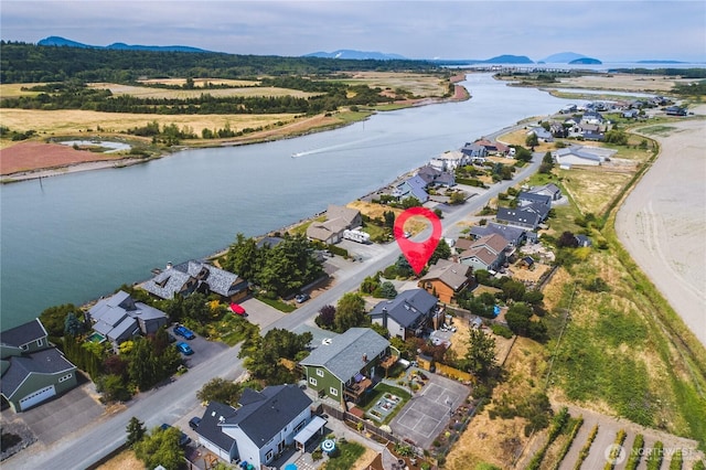 14785 Channel Dr, La Conner, WA 98257 - aerial overview of property's location with a water and mountain view and nearby suburban area