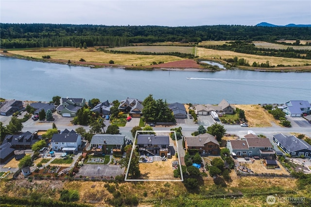 14785 Channel Dr, La Conner, WA 98257 - aerial perspective of suburban area featuring a nearby body of water and property boundaries highlighted