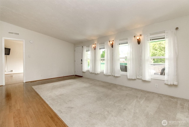 1106 29th St SE, Auburn, WA 98002 - unfurnished living room with wood finished floors