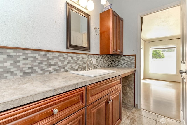 1106 29th St SE, Auburn, WA 98002 - bathroom with vanity, tasteful backsplash, and tile patterned flooring