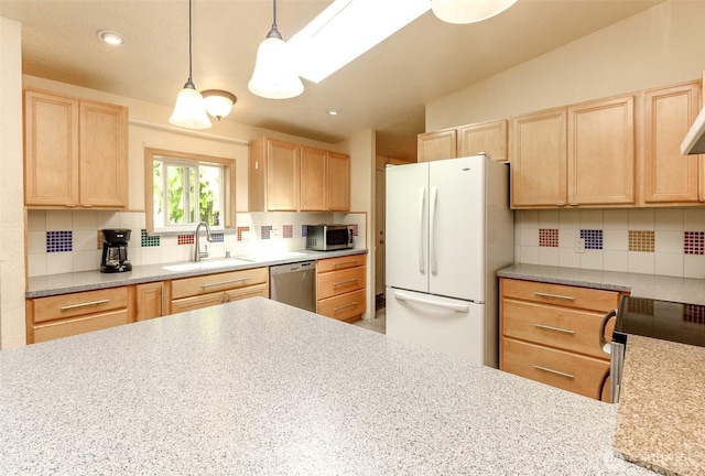 1106 29th St SE, Auburn, WA 98002 - kitchen featuring light brown cabinetry, appliances with stainless steel finishes, tasteful backsplash, and recessed lighting