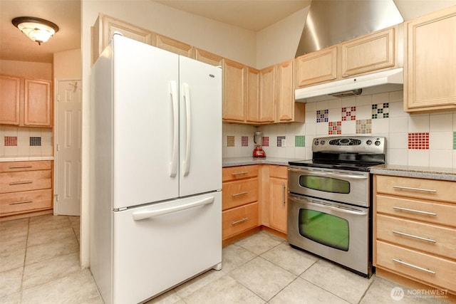 1106 29th St SE, Auburn, WA 98002 - kitchen featuring freestanding refrigerator, light brown cabinetry, under cabinet range hood, and double oven range
