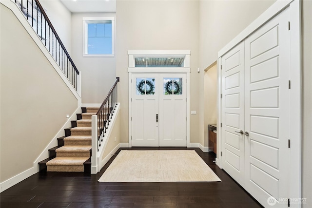 24130 145th Ave SE, Snohomish, WA 98296 - foyer with stairs, dark wood-style floors, and a towering ceiling