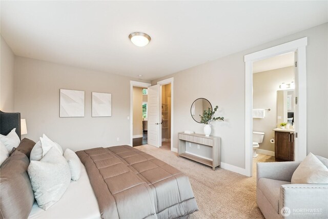24130 145th Ave SE, Snohomish, WA 98296 - bedroom with light colored carpet and connected bathroom