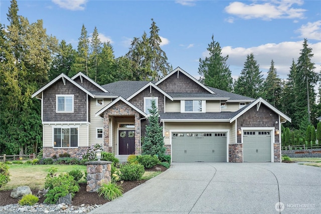 24130 145th Ave SE, Snohomish, WA 98296 - craftsman inspired home featuring stone siding, driveway, an attached garage, and a shingled roof
