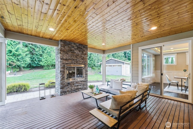 24130 145th Ave SE, Snohomish, WA 98296 - wooden deck featuring an outdoor structure, a lawn, and an outdoor hangout area