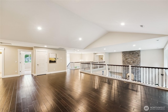 24130 145th Ave SE, Snohomish, WA 98296 - spare room with lofted ceiling, wood finished floors, and recessed lighting