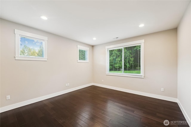 24130 145th Ave SE, Snohomish, WA 98296 - unfurnished room featuring dark wood finished floors and recessed lighting