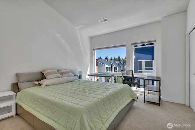 8537 22nd Pl NE, Seattle, WA 98115 - bedroom with light colored carpet and baseboards