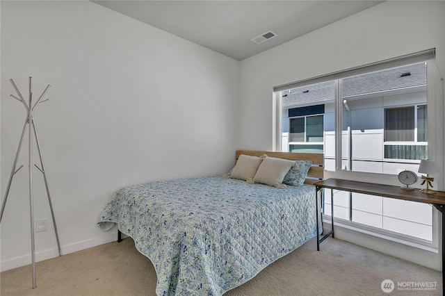 8537 22nd Pl NE, Seattle, WA 98115 - carpeted bedroom featuring baseboards