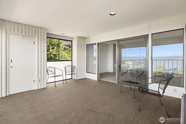 8005 Sand Point Way NE Unit A52, Seattle, WA 98115 - sunroom / solarium featuring a water view