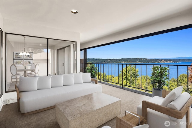 8005 Sand Point Way NE Unit A52, Seattle, WA 98115 - balcony with outdoor lounge area and a water view
