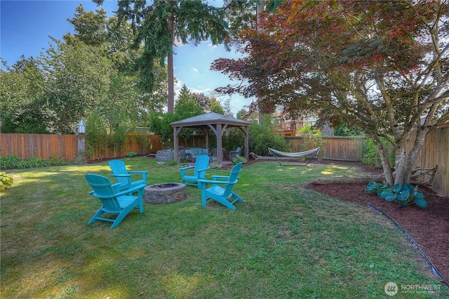 1717 SW 347th Pl, Federal Way, WA 98023 - fenced backyard featuring a fire pit and a gazebo