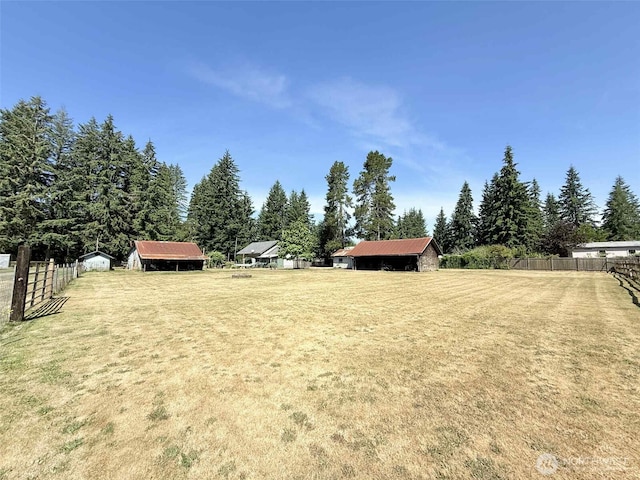 15 S Heise Rd, Elma, WA 98541 - view of yard featuring an outdoor structure and a pole building