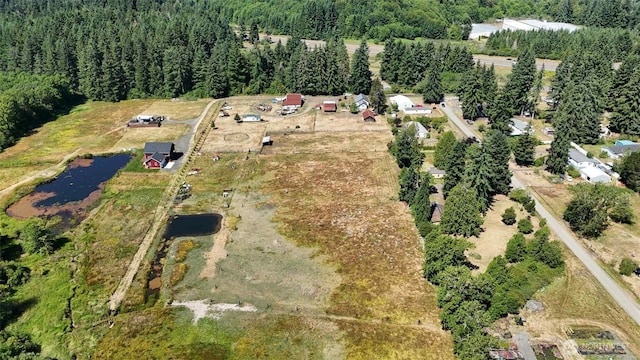 15 S Heise Rd, Elma, WA 98541 - aerial overview of property's location featuring a heavily wooded area