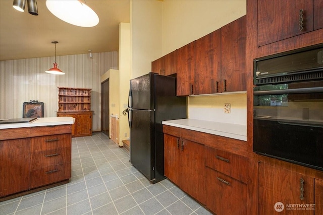 18707 25th Ave NE, Lake Forest Park, WA 98155 - kitchen with black appliances, light countertops, and pendant lighting