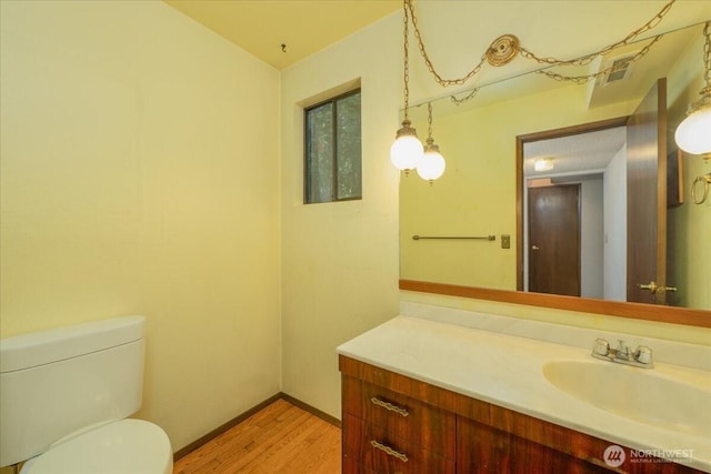 18707 25th Ave NE, Lake Forest Park, WA 98155 - bathroom featuring vanity and wood finished floors