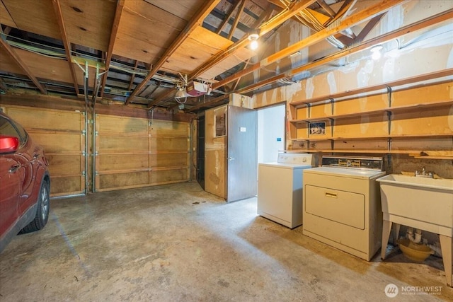 18707 25th Ave NE, Lake Forest Park, WA 98155 - garage featuring washer and clothes dryer and a garage door opener