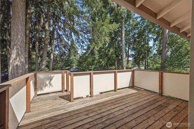 2810 Brentwood Dr SE, Lacey, WA 98503 - wooden terrace with view of wooded area