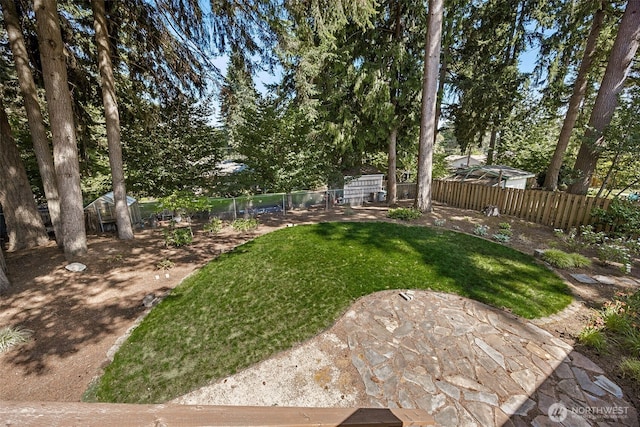 2810 Brentwood Dr SE, Lacey, WA 98503 - fenced backyard featuring a patio area