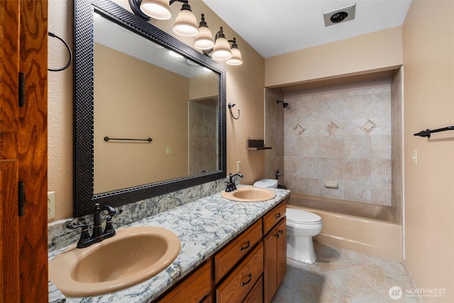 2515 87th Avenue Ct E, Edgewood, WA 98371 - full bath with double vanity, tile patterned floors, and shower / tub combination