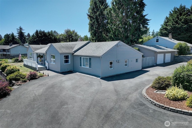 17003 53rd Ave S, Seatac, WA 98188 - ranch-style home with roof with shingles and a detached garage