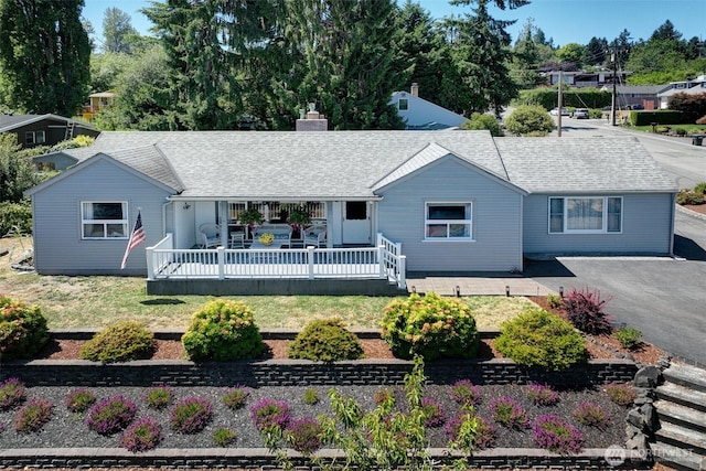17003 53rd Ave S, Seatac, WA 98188 - ranch-style house featuring a chimney, a deck, and roof with shingles