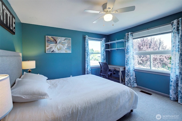17003 53rd Ave S, Seatac, WA 98188 - carpeted bedroom featuring a ceiling fan and baseboards
