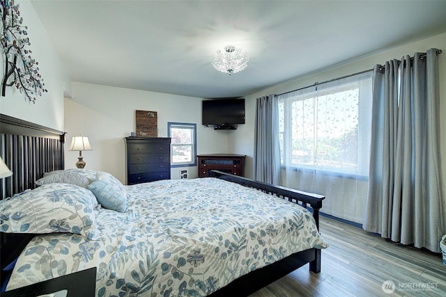 17003 53rd Ave S, Seatac, WA 98188 - bedroom featuring multiple windows and wood finished floors
