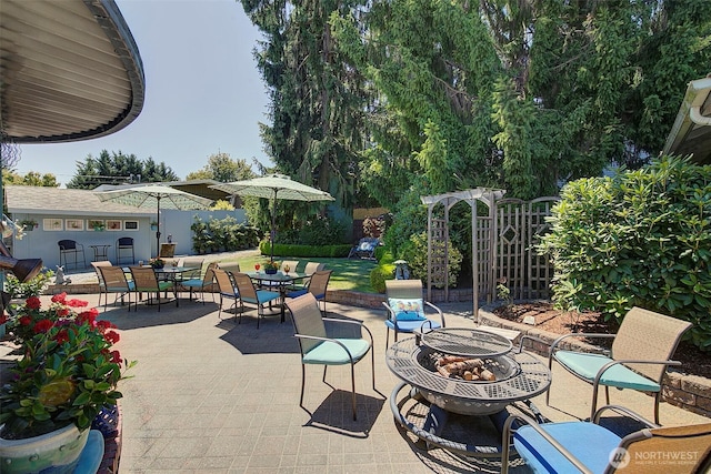 17003 53rd Ave S, Seatac, WA 98188 - view of patio with an outdoor fire pit and outdoor dining space