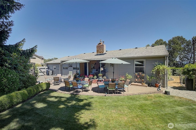 17003 53rd Ave S, Seatac, WA 98188 - back of house featuring a patio and a chimney